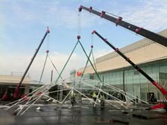 home 14 UNIC mini cranes assemble Christmas displays